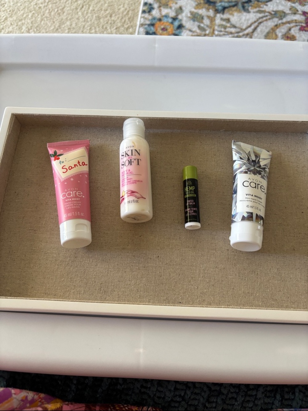 Avon Skincare Tubes and Lip Balm in Pink, White, Green, and Silver